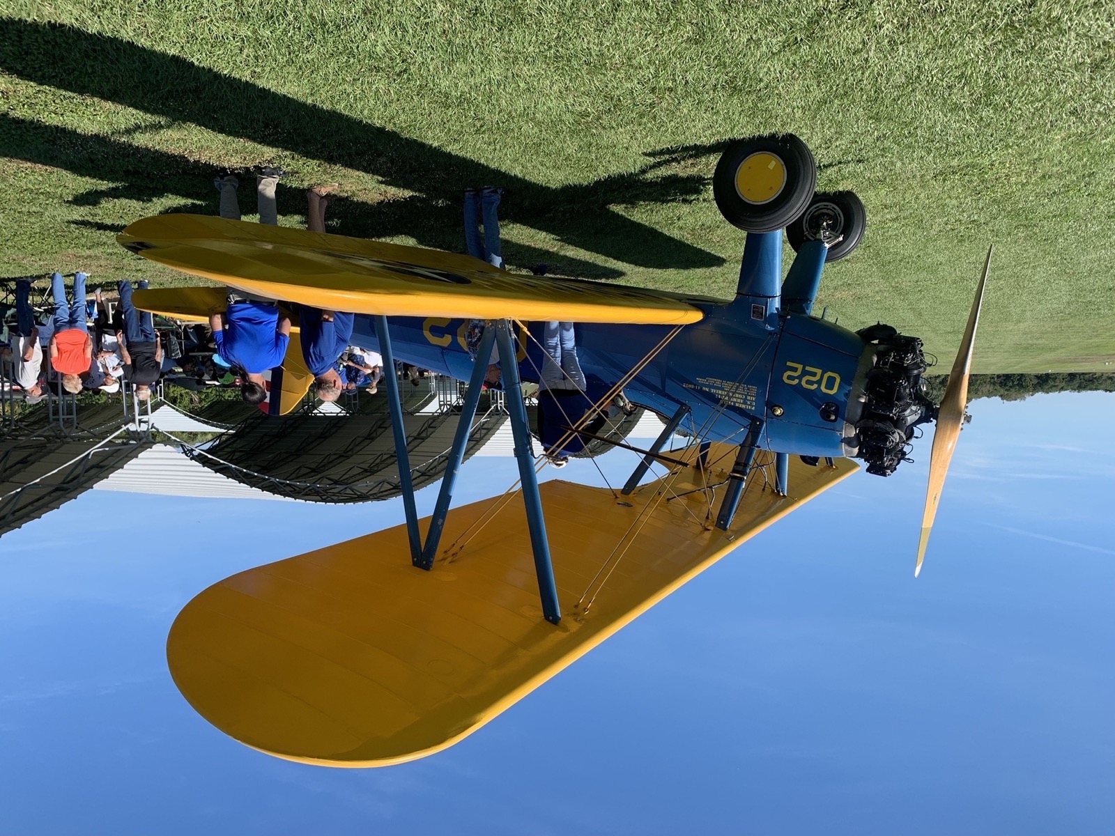 Stearman biplane on the ground at a fly-in